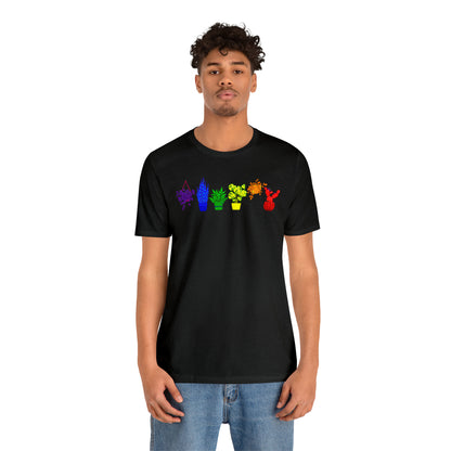 A t-shirt with a vibrant design of plants in the colors of the Pride rainbow.