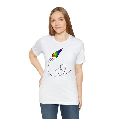 A vibrant t-shirt featuring a paper airplane design in the Pride rainbow colors. The rainbow colors symbolize LGBTQ+ pride and inclusivity.