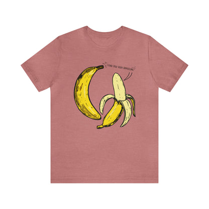 T-shirt product featuring two bananas with the pun 'I find you very appealing'. Get ready to go bananas with this hilarious design that is sure to make everyone smile. Perfect for those who appreciate a good pun and love to showcase their fun-loving personality. Grab this t-shirt and let the laughter begin!