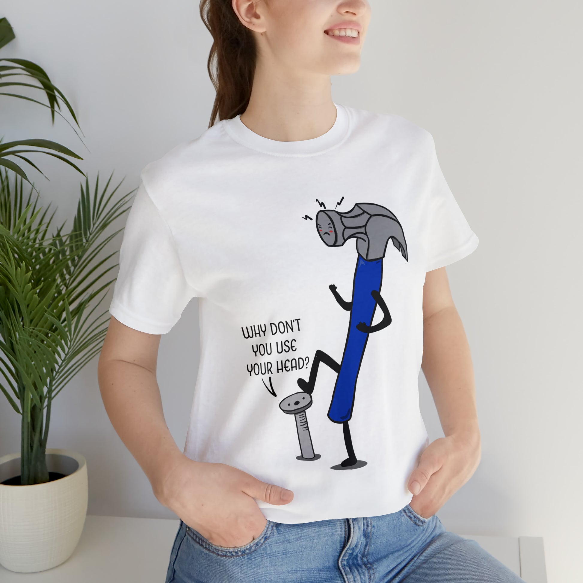 A humorous cartoon illustration depicting a hammer and nail. The nail is holding a thought bubble with the text "Why don't you use your head?" This image combines wit and creativity.