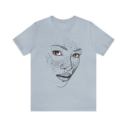 A person wearing a t-shirt with an illustration of a confident and empowered woman. The drawing depicts a woman with a sense of security, strength, and empowerment.