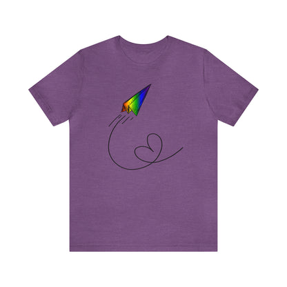 A vibrant t-shirt featuring a paper airplane design in the Pride rainbow colors. The rainbow colors symbolize LGBTQ+ pride and inclusivity.