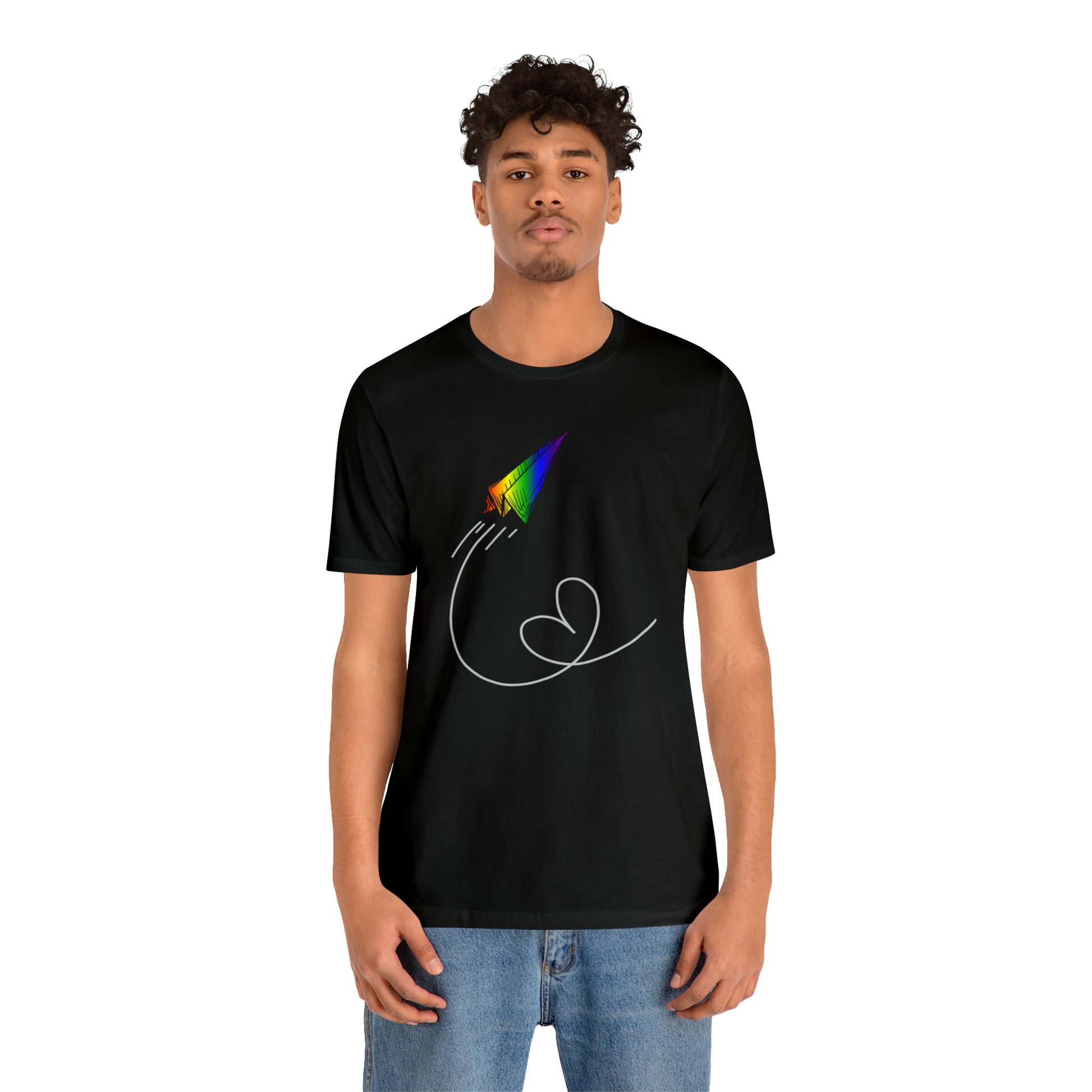 A vibrant t-shirt featuring a paper airplane design in the Pride rainbow colors. The rainbow colors symbolize LGBTQ+ pride and inclusivity.