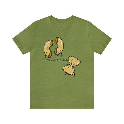 A t-shirt with a playful design of an elbow pasta and a bow tie pasta, forming a pun that says 'I feel overdressed'.