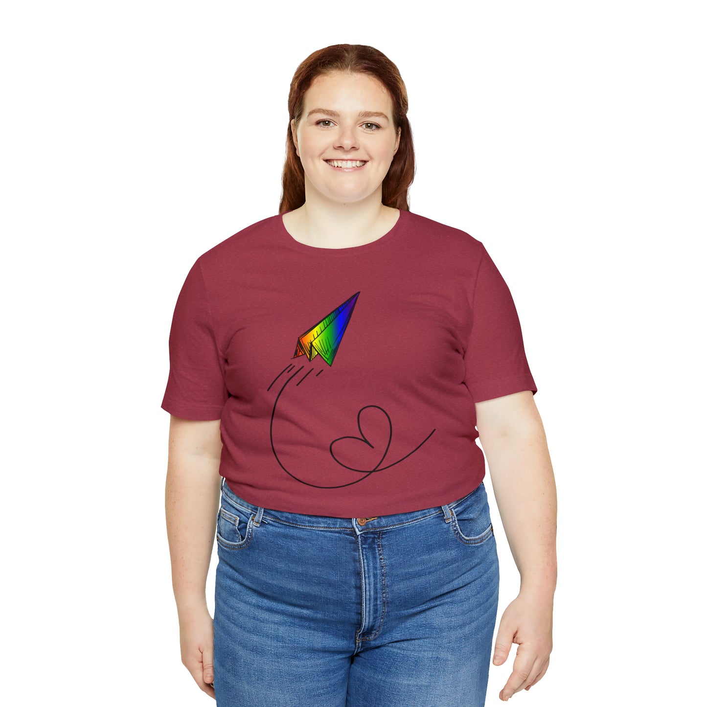 A vibrant t-shirt featuring a paper airplane design in the Pride rainbow colors. The rainbow colors symbolize LGBTQ+ pride and inclusivity.