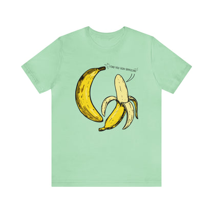 T-shirt product featuring two bananas with the pun 'I find you very appealing'. Get ready to go bananas with this hilarious design that is sure to make everyone smile. Perfect for those who appreciate a good pun and love to showcase their fun-loving personality. Grab this t-shirt and let the laughter begin! 