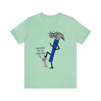 A humorous cartoon illustration depicting a hammer and nail. The nail is holding a thought bubble with the text "Why don't you use your head?" This image combines wit and creativity.