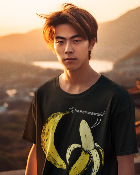 T-shirt product featuring two bananas with the pun 'I find you very appealing'. Get ready to go bananas with this hilarious design that is sure to make everyone smile. Perfect for those who appreciate a good pun and love to showcase their fun-loving personality. Grab this t-shirt and let the laughter begin!