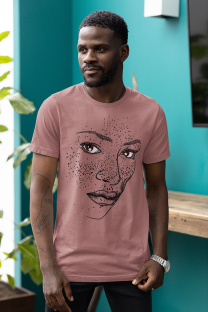 A person wearing a t-shirt with an illustration of a confident and empowered woman. The drawing depicts a woman with a sense of security, strength, and empowerment.