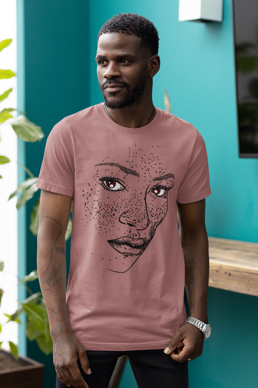 A person wearing a t-shirt with an illustration of a confident and empowered woman. The drawing depicts a woman with a sense of security, strength, and empowerment.